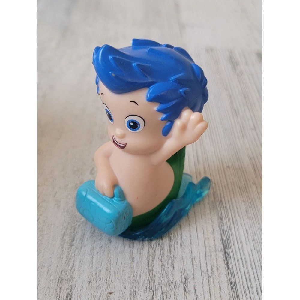 Bubble Guppies Gil mermaid boy toy figure roller ball‎
